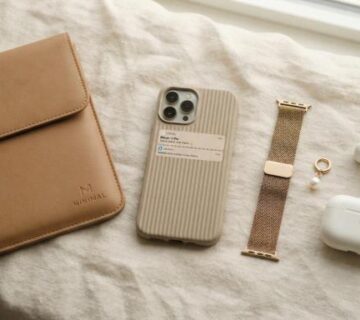 aesthetic tech accessories flat lay with phone case and laptop sleeve