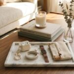 how to style a coffee table with books tray and decor