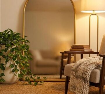cozy reading nook ideas in a small corner with armchair and lamp